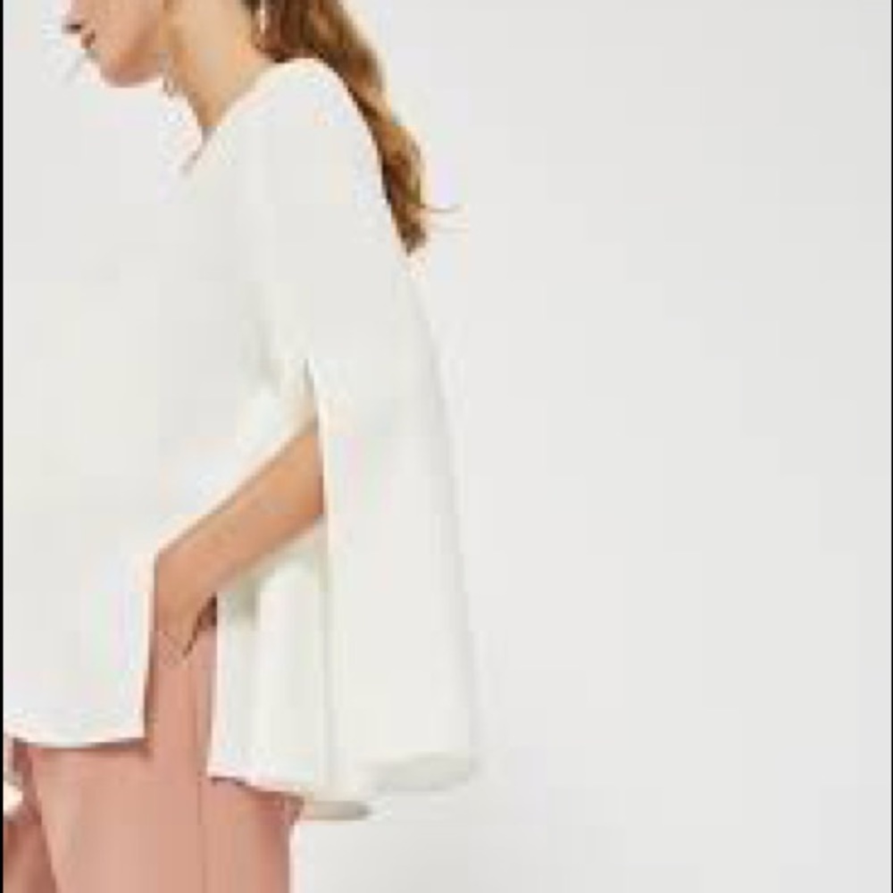 Off white v neck, split bell sleeve top